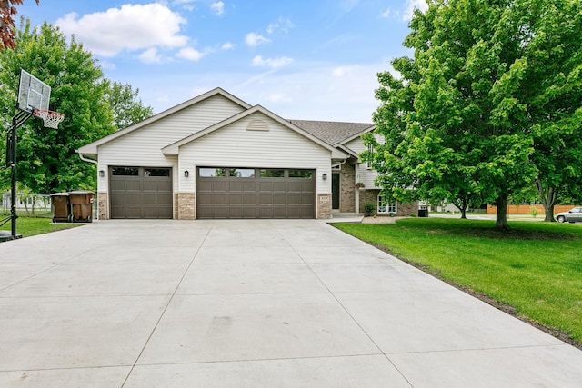 1600 Buffalo Cv, Buffalo, MN 55313 - view of front of house featuring a front lawn, concrete driveway, an attached garage, and brick siding