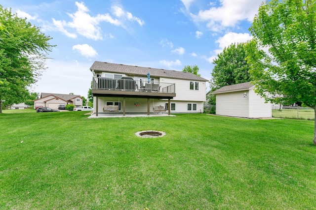 1600 Buffalo Cv, Buffalo, MN 55313 - back of house featuring a patio area, a deck, a yard, and an outdoor fire pit
