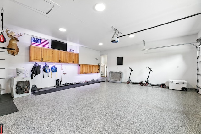 1600 Buffalo Cv, Buffalo, MN 55313 - garage with a garage door opener and recessed lighting