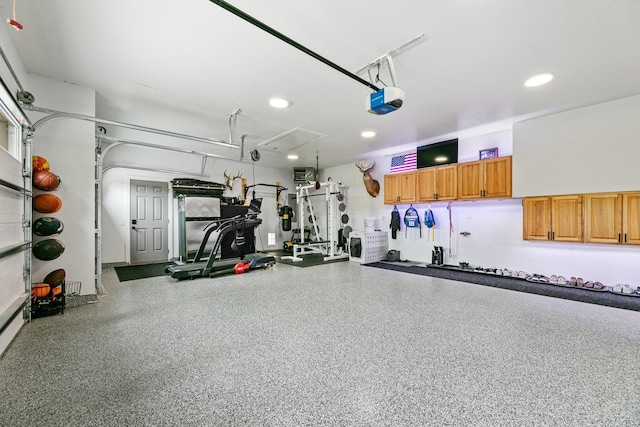 1600 Buffalo Cv, Buffalo, MN 55313 - workout area featuring a garage, attic access, and recessed lighting