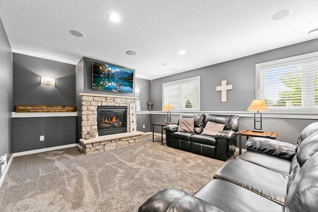 1600 Buffalo Cv, Buffalo, MN 55313 - living room with a fireplace, carpet, a textured ceiling, and baseboards