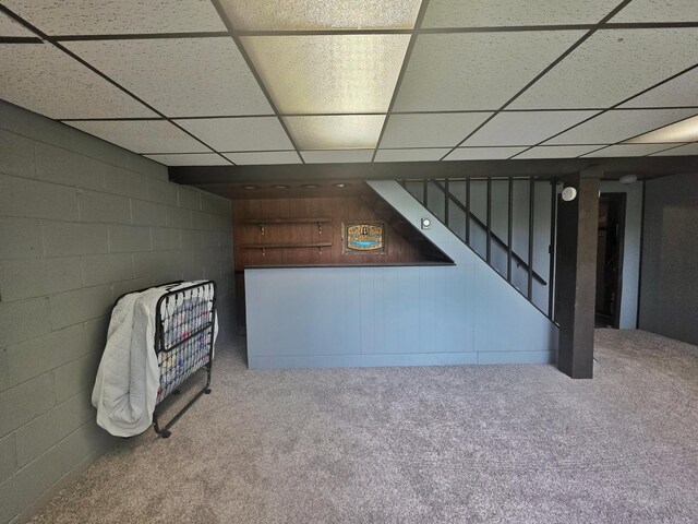 1331 9th St, Grand Rapids, MN 55744 - finished basement with carpet floors, concrete block wall, a drop ceiling, and stairway
