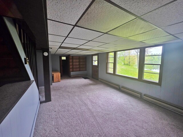 1331 9th St, Grand Rapids, MN 55744 - unfurnished sunroom featuring a baseboard heating unit