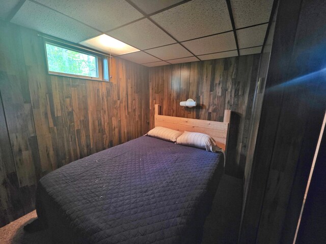1331 9th St, Grand Rapids, MN 55744 - bedroom with wood walls and a paneled ceiling
