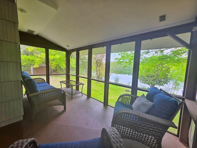 1331 9th St, Grand Rapids, MN 55744 - sunroom / solarium featuring a water view, vaulted ceiling, and plenty of natural light