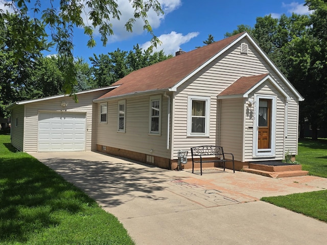 1156 River Rd, Windom, MN 56101 - view of front facade featuring crawl space, a garage, a front yard, a shingled roof, and driveway