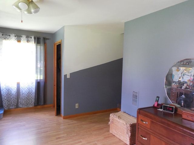 1156 River Rd, Windom, MN 56101 - living area featuring light wood-type flooring and ceiling fan