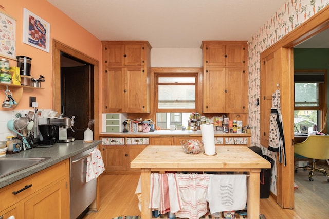 1808 Taylor St NE, Minneapolis, MN 55418 - kitchen with dishwasher, light wood-style flooring, and butcher block countertops