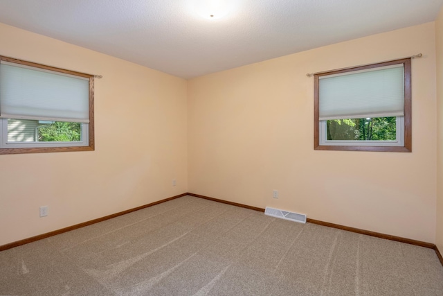601 4th Ave N, Sauk Rapids, MN 56379 - carpeted empty room featuring baseboards