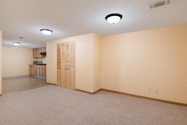 601 4th Ave N, Sauk Rapids, MN 56379 - empty room featuring baseboards and light colored carpet