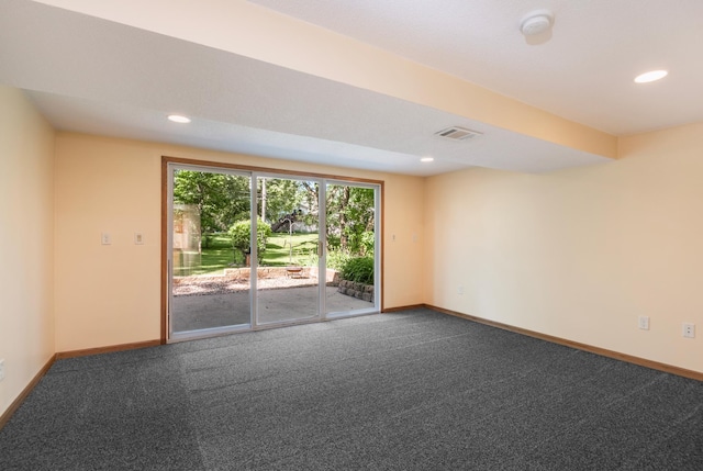 601 4th Ave N, Sauk Rapids, MN 56379 - spare room featuring dark colored carpet and recessed lighting