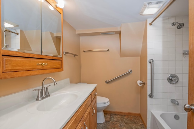 601 4th Ave N, Sauk Rapids, MN 56379 - bathroom featuring vanity, washtub / shower combination, and stone finish flooring