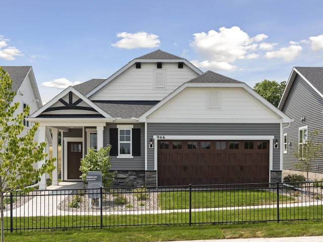 973 Goldfinch St, Chaska, MN 55318 - view of front of house with a garage, roof with shingles, and stone siding