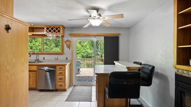 1504 89th Ave N, Brooklyn Park, MN 55444 - kitchen featuring dishwasher, open shelves, a sink, light countertops, and a textured ceiling