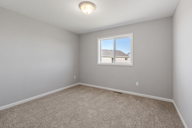 1020 2nd St NW, Delano, MN 55328 - unfurnished room featuring carpet floors and baseboards