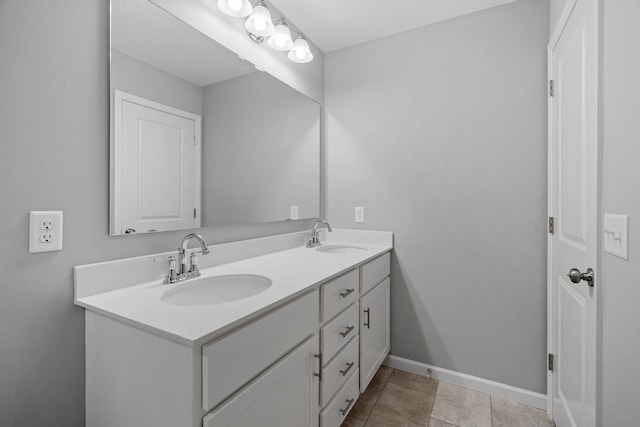 1020 2nd St NW, Delano, MN 55328 - full bath featuring double vanity and baseboards