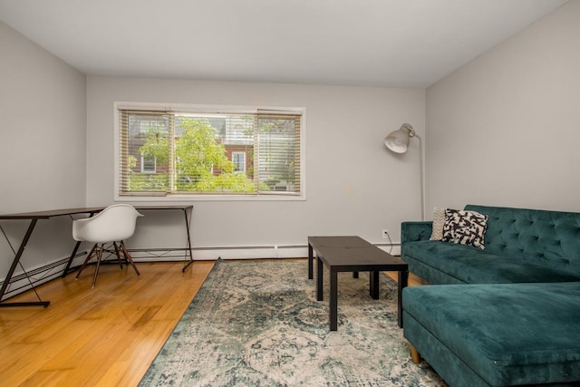 3018 Aldrich Ave S Unit 12, Minneapolis, MN 55408 - living room with wood finished floors and a baseboard radiator