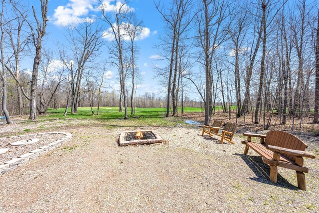 40276 Fairway Ln, Onamia, MN 56359 - view of yard with a fire pit