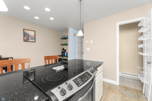 309 12 1/2 Ave E, West Fargo, ND 58078 - kitchen with stainless steel range with electric stovetop, a baseboard heating unit, recessed lighting, white cabinetry, and hanging light fixtures