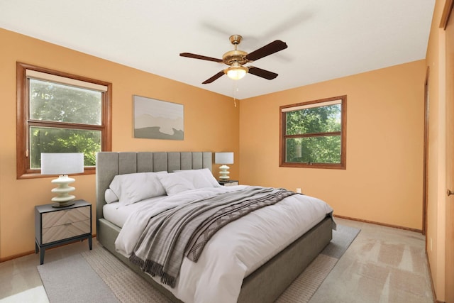 15423 Boulder Creek Dr, Minnetonka, MN 55345 - bedroom featuring baseboards, light colored carpet, and a ceiling fan