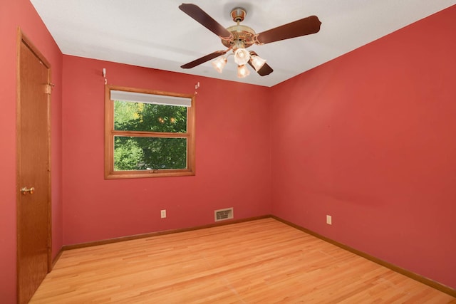 15423 Boulder Creek Dr, Minnetonka, MN 55345 - empty room with light wood-style floors, baseboards, and ceiling fan
