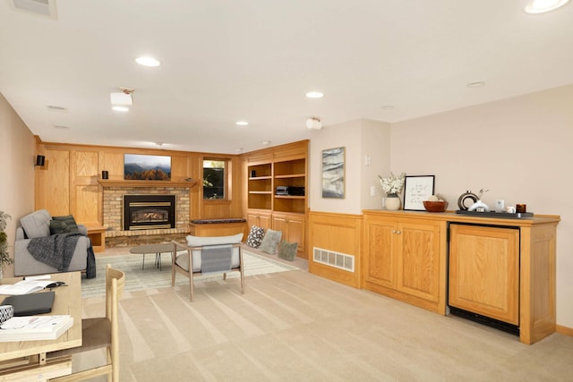15423 Boulder Creek Dr, Minnetonka, MN 55345 - living room with light carpet, a brick fireplace, recessed lighting, and built in shelves