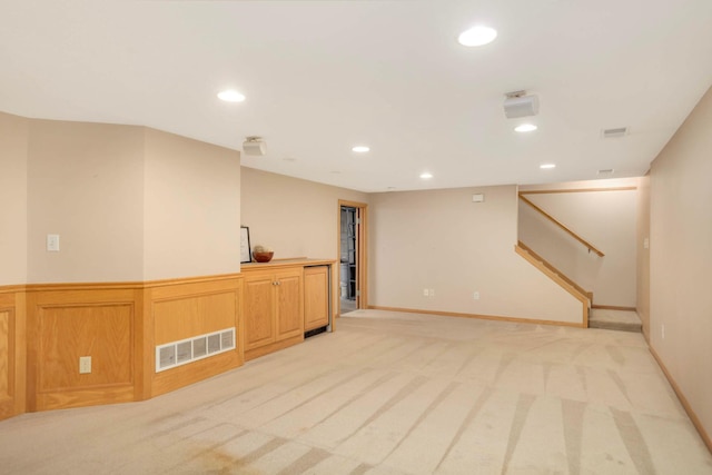 15423 Boulder Creek Dr, Minnetonka, MN 55345 - finished below grade area with light colored carpet, recessed lighting, and stairs