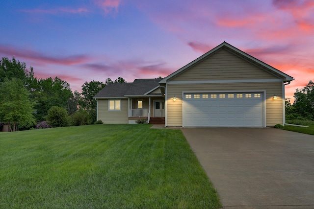1426 Woodland Way, Lake City, MN 55041 - ranch-style house with driveway, covered porch, a yard, and an attached garage