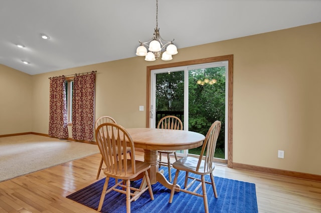 1426 Woodland Way, Lake City, MN 55041 - dining space with light wood-style floors, baseboards, and a chandelier