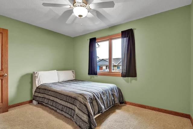 1426 Woodland Way, Lake City, MN 55041 - carpeted bedroom featuring baseboards and ceiling fan