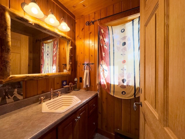 X Waters Island, Morse Twp, MN 55731 - bathroom with vanity, wooden walls, and wooden ceiling