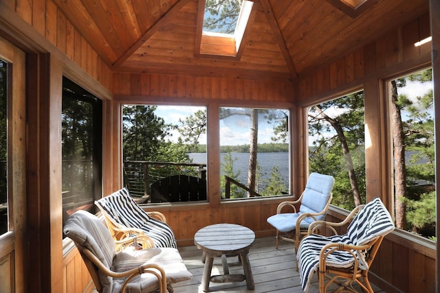 X Waters Island, Morse Twp, MN 55731 - sunroom / solarium with a water view, lofted ceiling, a skylight, hardwood / wood-style floors, and wood ceiling
