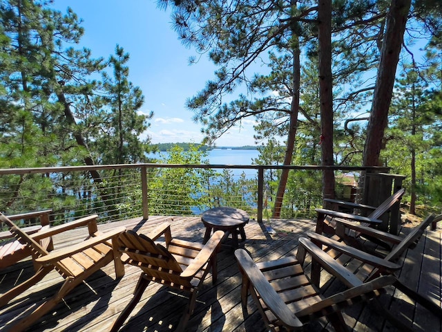 X Waters Island, Morse Twp, MN 55731 - wooden terrace featuring a water view