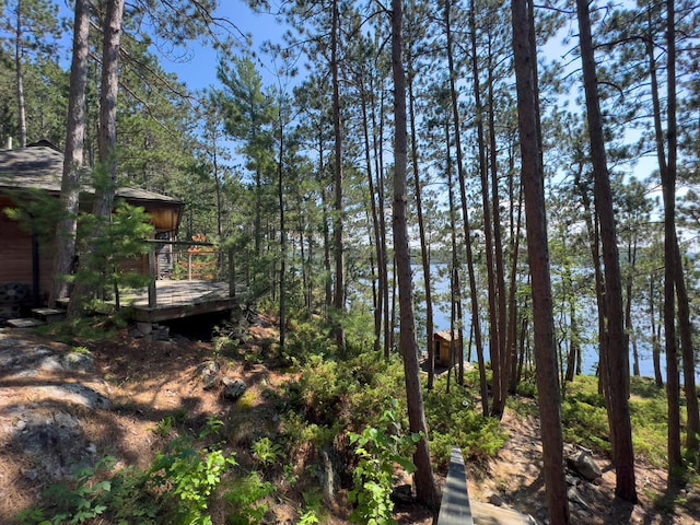 X Waters Island, Morse Twp, MN 55731 - view of yard featuring a wooden deck
