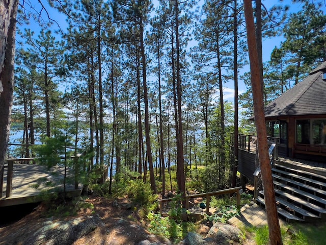 X Waters Island, Morse Twp, MN 55731 - view of yard with a deck