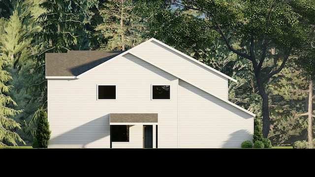5223 Harvest Square Ln NW, Rochester, MN 55901 - view of side of home featuring a shingled roof