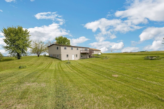 19363 County Road 21, Eden Lake Twp, MN 56368 - view of grassy yard featuring a wooden deck and a rural view