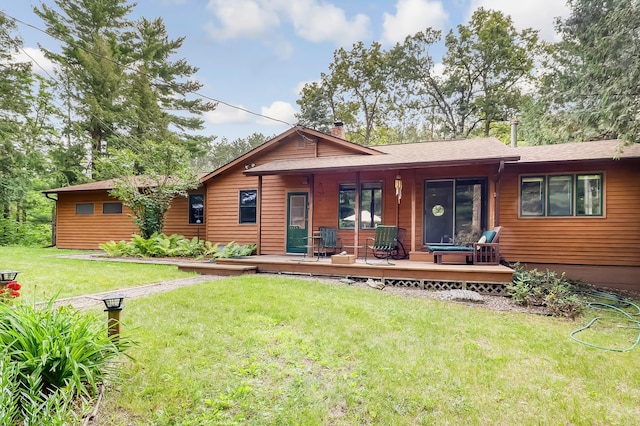 20434 Tiedeman Rd, Rochert, MN 56578 - back of property with a lawn and a chimney