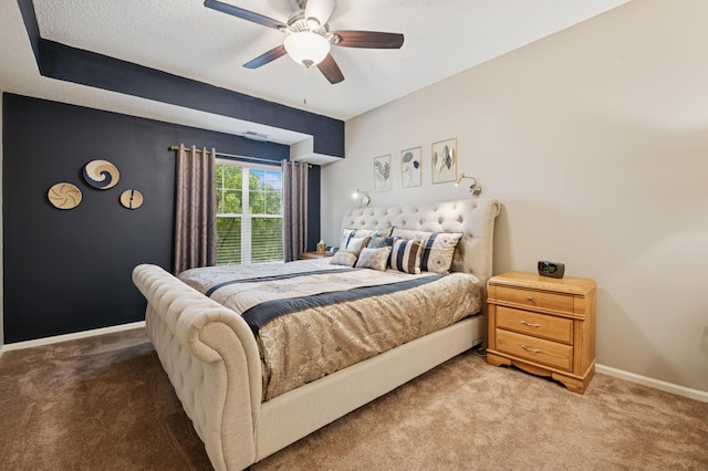 3800 85th Ave N Unit 312, Brooklyn Park, MN 55443 - bedroom with carpet flooring, a textured ceiling, baseboards, and a ceiling fan