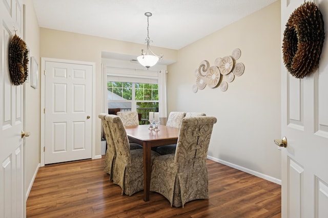 3800 85th Ave N Unit 312, Brooklyn Park, MN 55443 - dining room with wood finished floors and baseboards