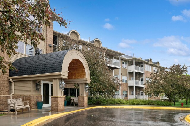 3800 85th Ave N Unit 312, Brooklyn Park, MN 55443 - view of apartment building / complex