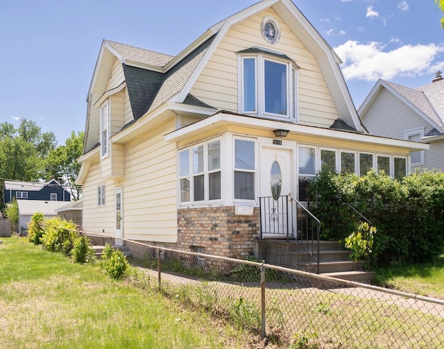 1638 Concordia Ave, Saint Paul, MN 55104 - dutch colonial featuring a gambrel roof and roof with shingles