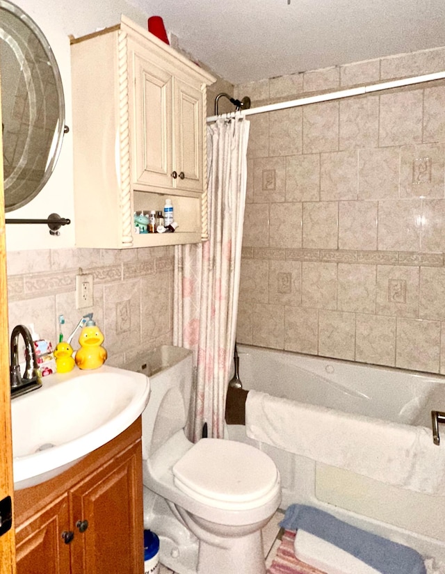 1638 Concordia Ave, Saint Paul, MN 55104 - bathroom with vanity, shower / bath combo with shower curtain, tile walls, and toilet