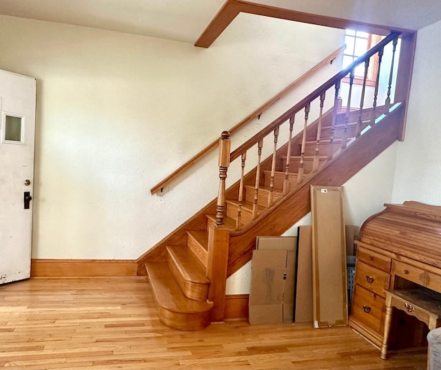 1638 Concordia Ave, Saint Paul, MN 55104 - stairs with wood finished floors and baseboards