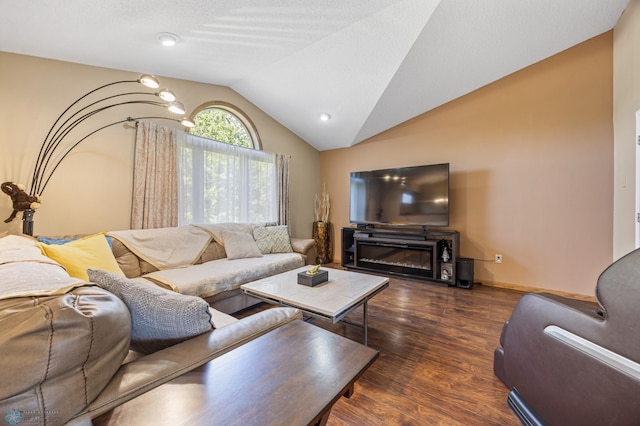 3138 25th Ave S, Fargo, ND 58103 - living room with vaulted ceiling, wood finished floors, and baseboards