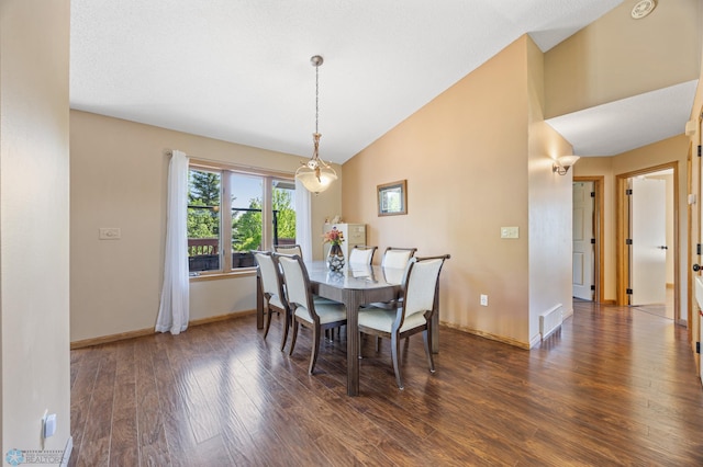 3138 25th Ave S, Fargo, ND 58103 - dining room with wood finished floors, baseboards, and high vaulted ceiling