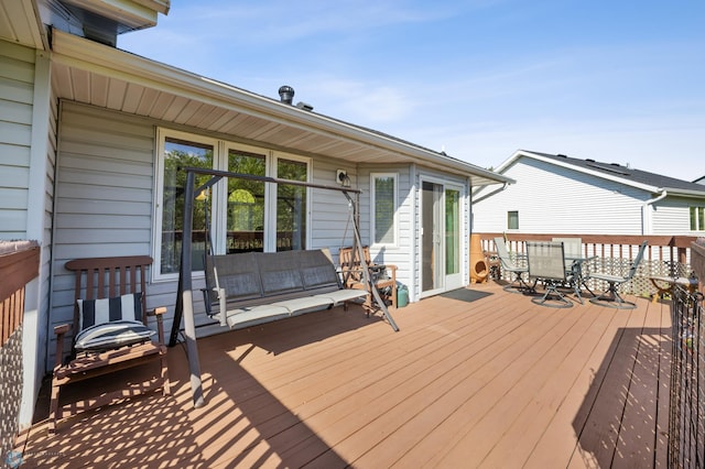3138 25th Ave S, Fargo, ND 58103 - wooden terrace with outdoor dining area