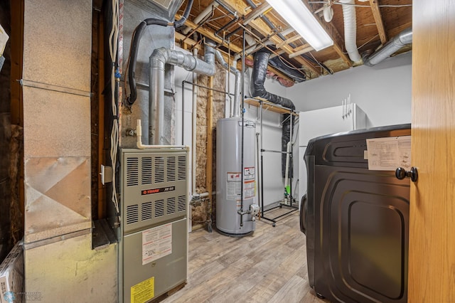 3138 25th Ave S, Fargo, ND 58103 - utility room with washer / clothes dryer and gas water heater