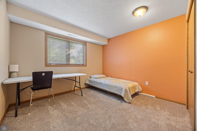 3138 25th Ave S, Fargo, ND 58103 - carpeted bedroom with baseboards, a textured ceiling, and an office area