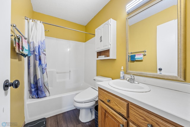 3138 25th Ave S, Fargo, ND 58103 - full bathroom featuring vanity, shower / bath combo, wood finished floors, and toilet